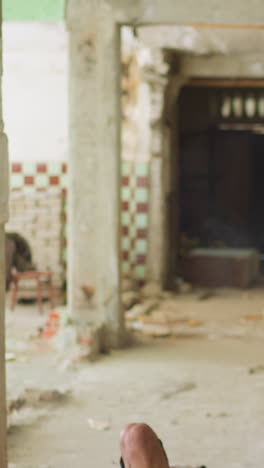Murder scene performance with professional actors playing kidnappers victim and special forces soldier at movie set in abandoned building slow motion