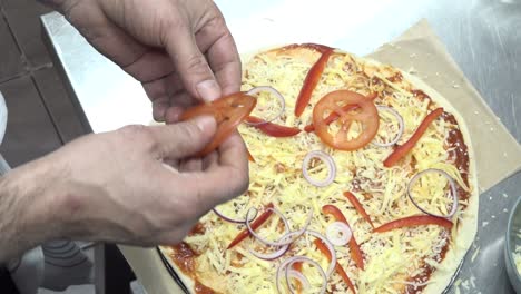 man kneading pizza dough by hand