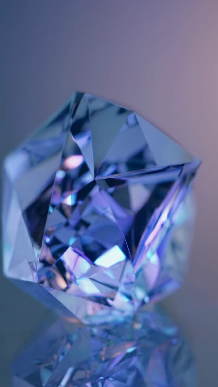 Close-up of a multifaceted crystal with a kaleidoscope of colors, captured at an oblique angle