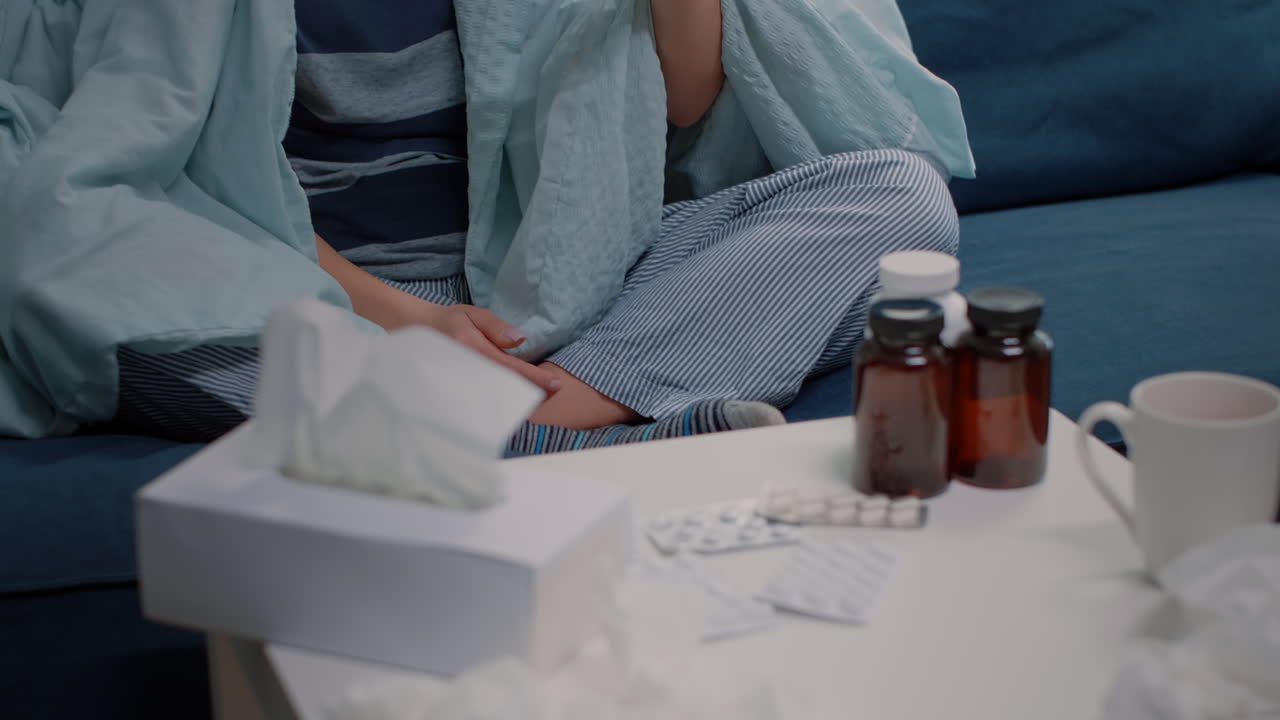 Empty architectural workplace with building model and 3d construction layout on table