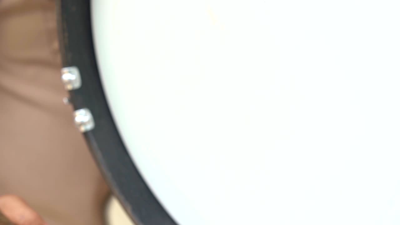 Drummer hitting drum slow motion