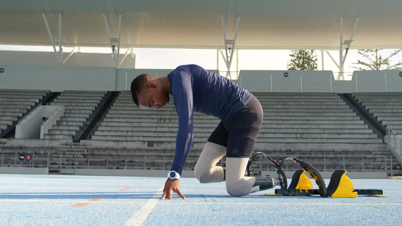 Male teen athlete planting blades in blocks, pushing off, launching as tech overlay mapping speed