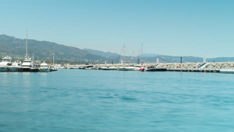 exotic port with yachts in estepona, time lapse pan view