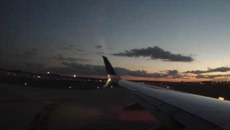 Looking-out-the-window-of-a-jet-lining-up-for-take-off