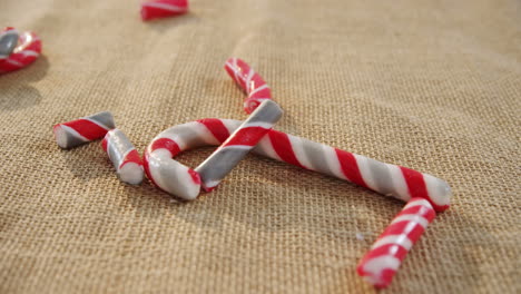 candy cane falling on textile 4k