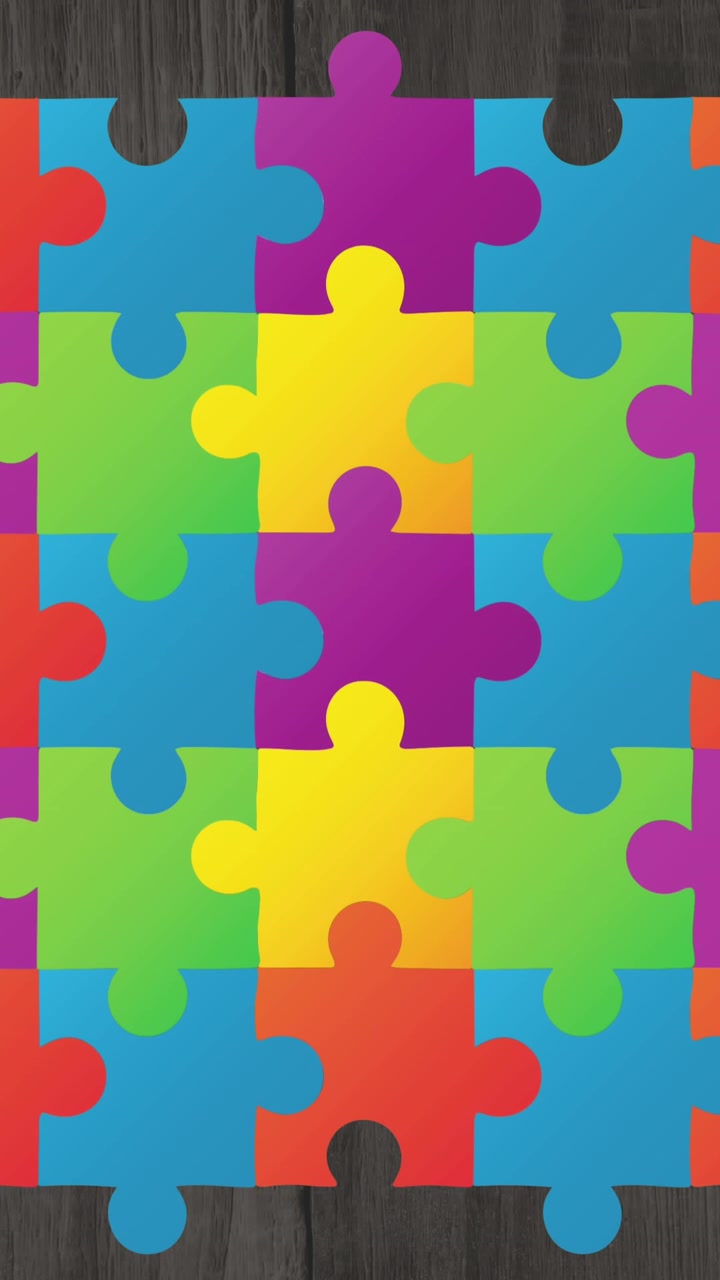 Animazione di pezzi di puzzle colorati, testo del mese della consapevolezza sull'autismo