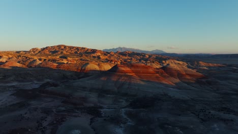 birdseye view of bentonite hills landscape in utah at sunset, usa