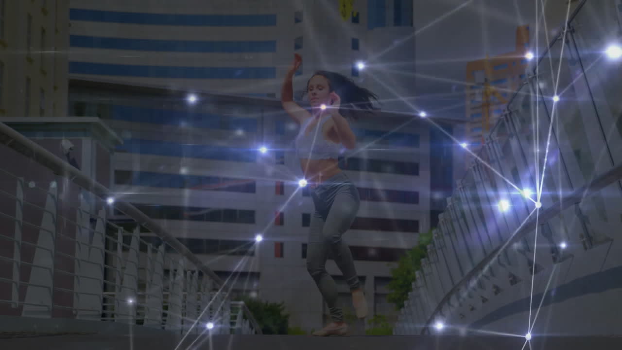 female athlete performing balancing pose on urban walkway, with technology glowing light overlay
