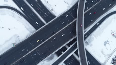 Aerial-view-of-a-freeway-intersection-Snow-covered-in-winter.