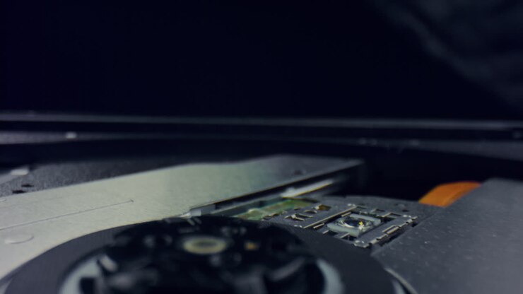 Computer hard drive disk in detail. Closeup computer hard disk inside