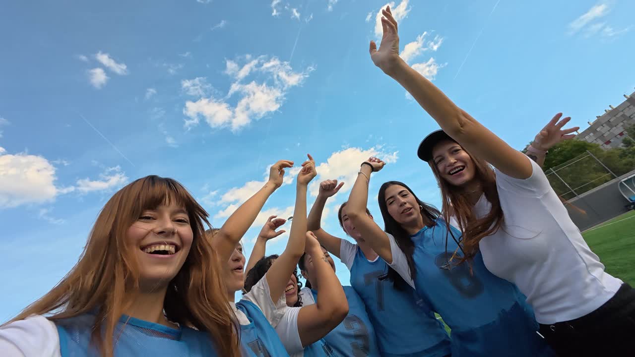 Group of Cheerful Women Celebrating Success Together