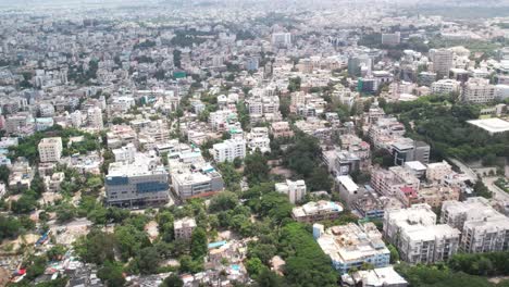 Afternoon in 4K Aerial footage of Hyderabad, Telangana, India&#039;s urban residential and commercial hubs Hill Top Colony, Banjara Hills, and Khairtabad