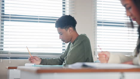 students in a classroom taking a test