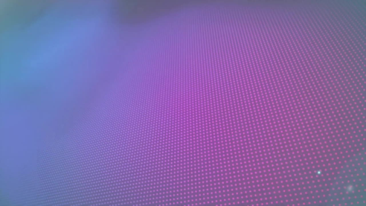 animación abstracta de puntos rosados y azules de gradiente que forman un patrón digital