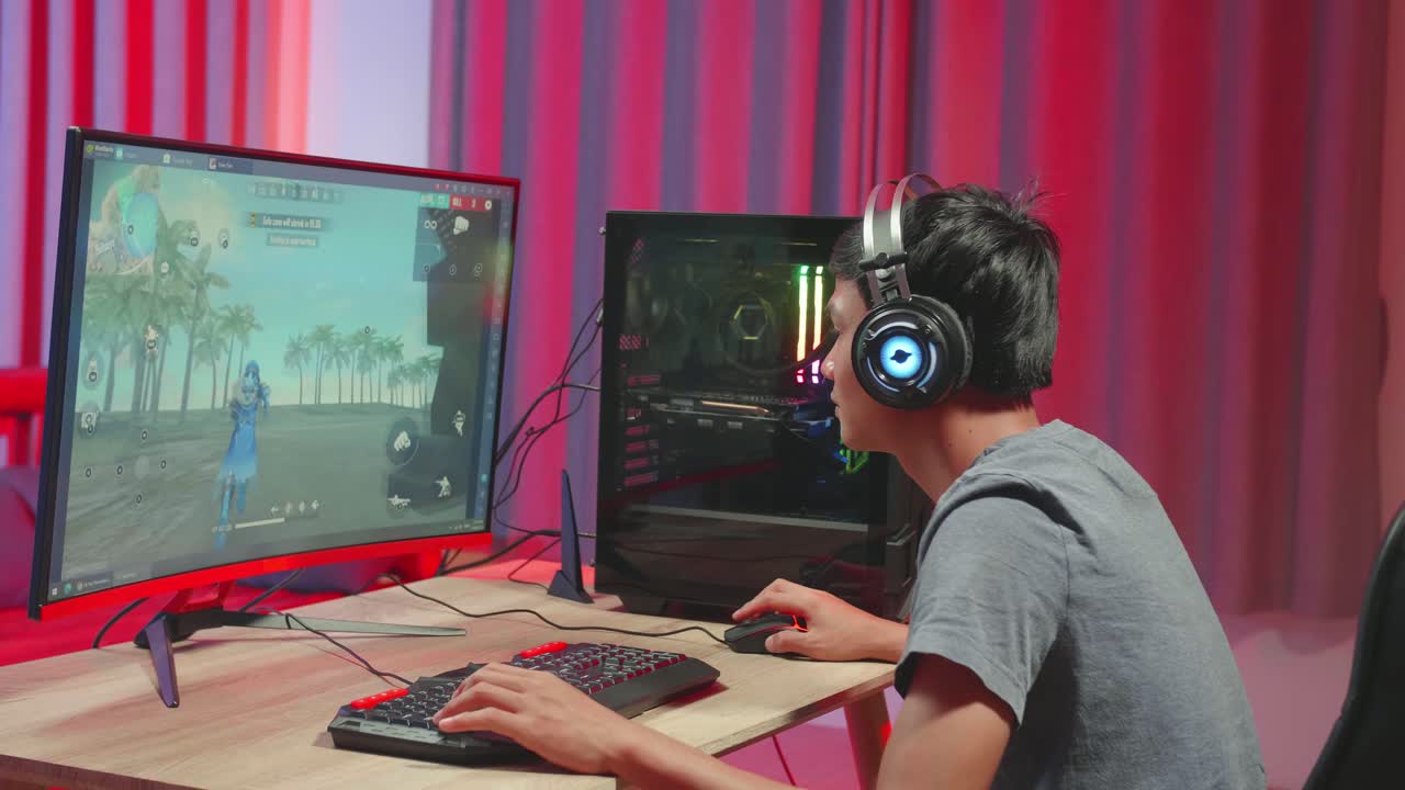 Asian Gamer Man Playing