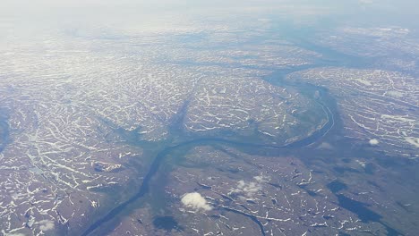 flying in a plane over greenland