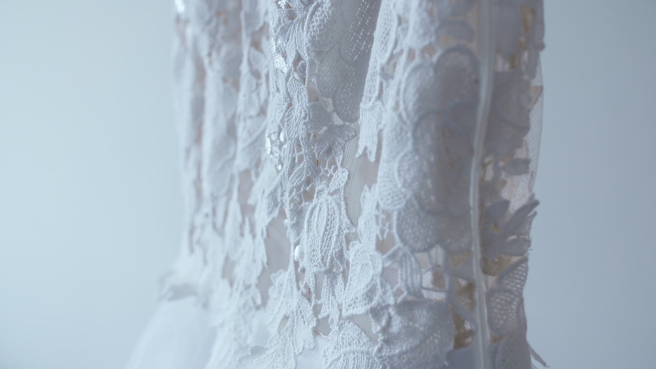 Close-up of a White Lace Wedding Dress