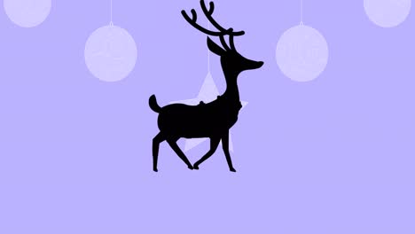 Black-silhouette-of-reindeer-walking-over-christmas-hanging-decorations-against-purple-background