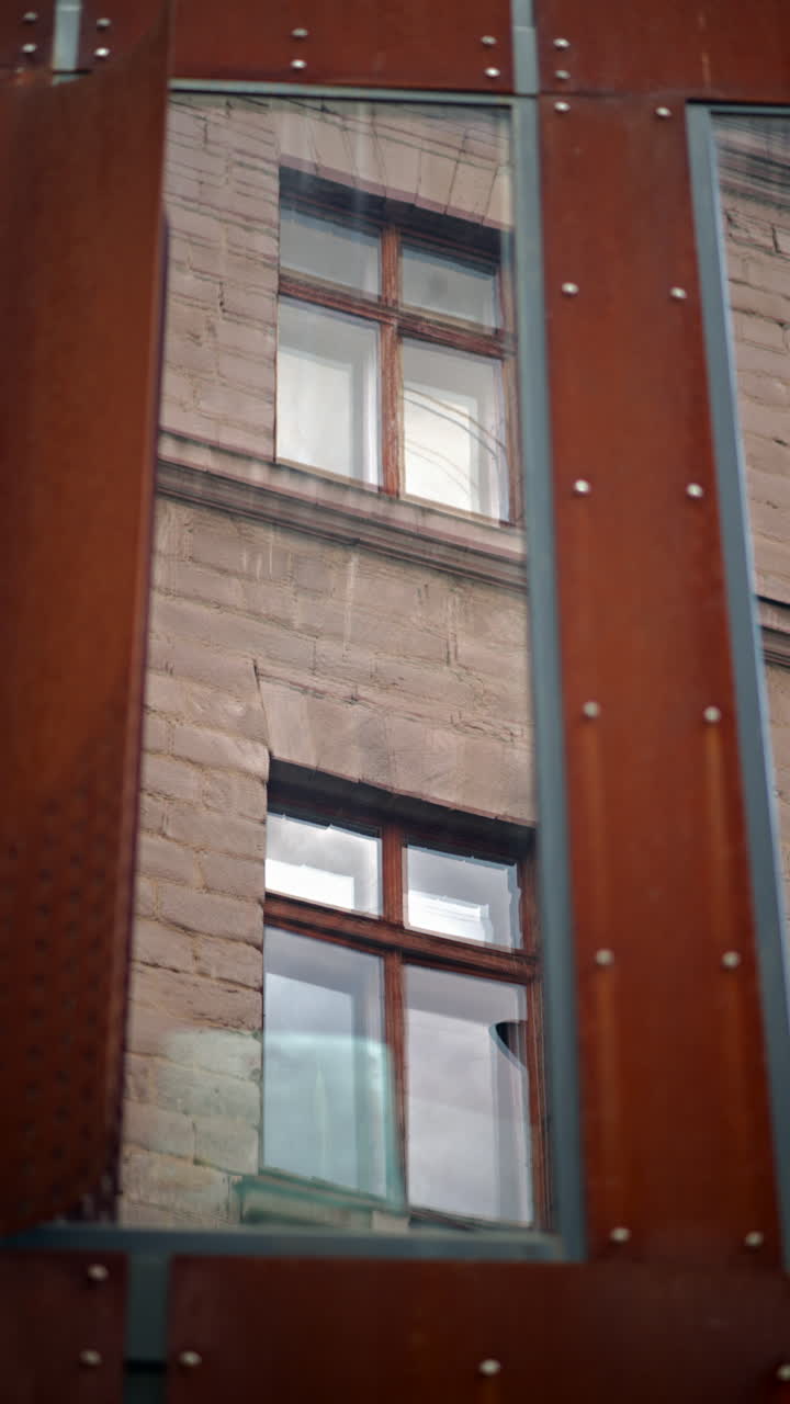View of an old building from a window. Vertical