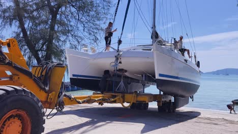 catamaran loading/unloading on beach