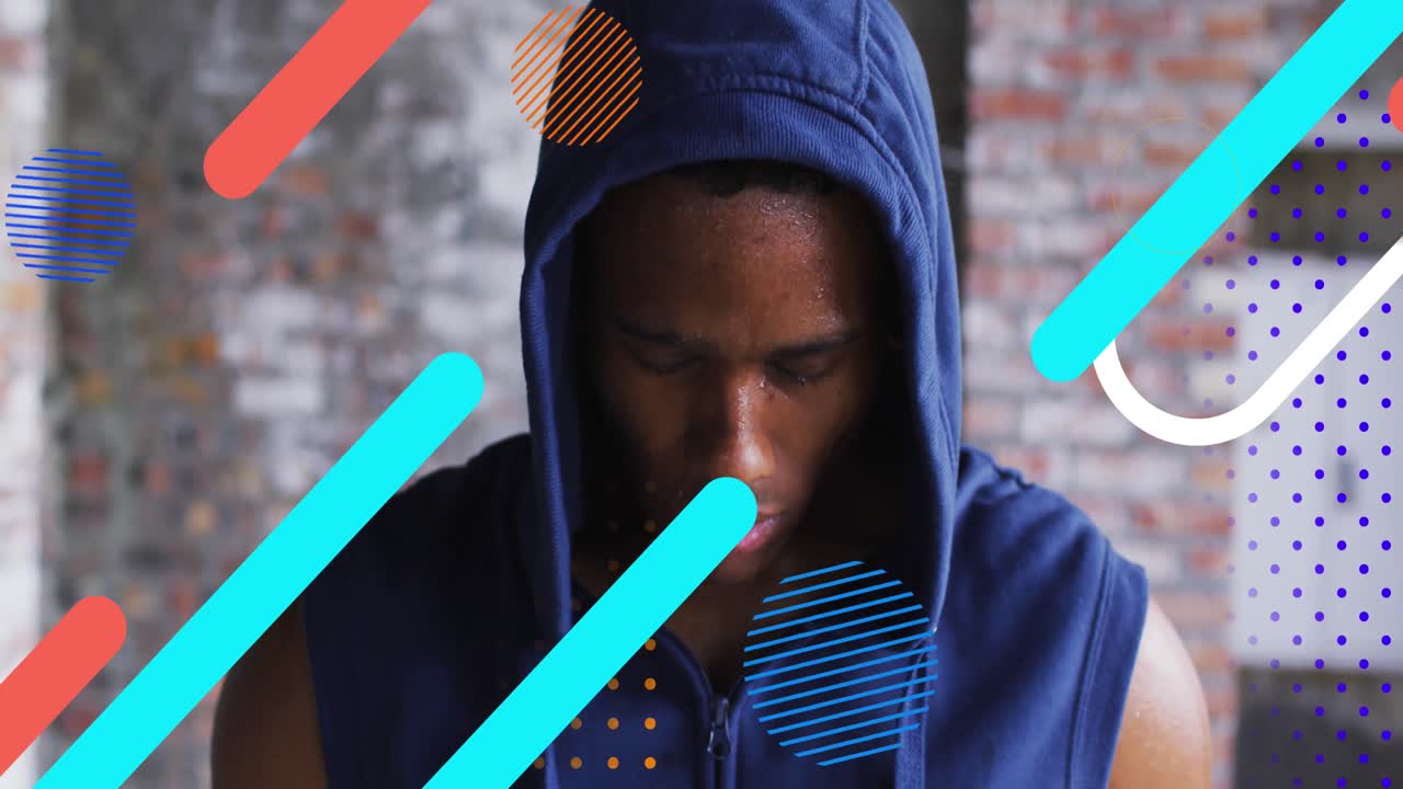 video compuesto digital de formas abstractas que se mueven contra el retrato de un hombre afroamericano