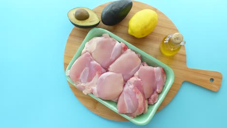 chicken thighs with avocado, lemon, and olive oil