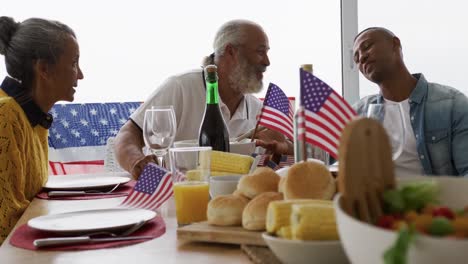 multi-generation family having celebration meal