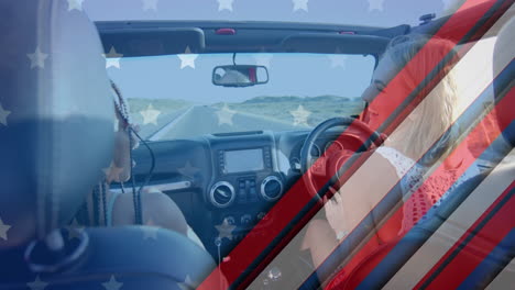 animation of flag of usa over happy diverse women in car by beach in summer