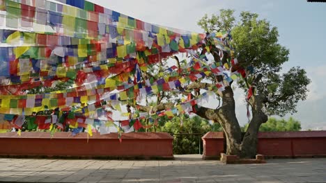 Buddhist-Prayer-Flags-at-Kathmandu-Temple-in-Nepal,-Bright-Colorful-Buddhist-Prayer-Flags-of-Bright-Colourful-Colours-at-the-Sacred-Holy-Religious-Site-for-Buddhism