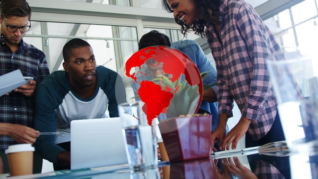 Animation of globe over diverse group of business people at meeting