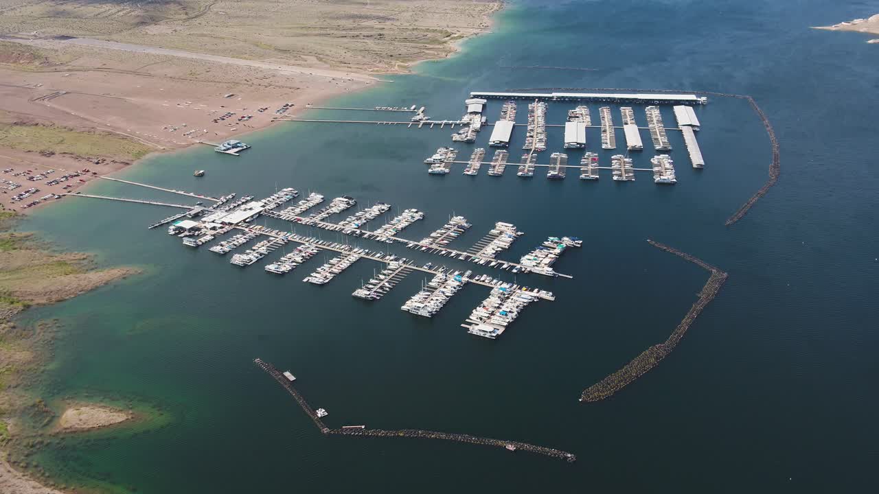 A high-flying drone shot over Lake Mead, a massive reservoir formed by the Hoover Dam on the Colorado River, that lies on the border of Arizona and Nevada, just east of Las Vegas
