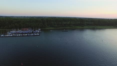 Aerial:-Wakeboard-cable-park-and-small-recreational-harbour-in-the-Veerse-Meer,-the-Netherlands