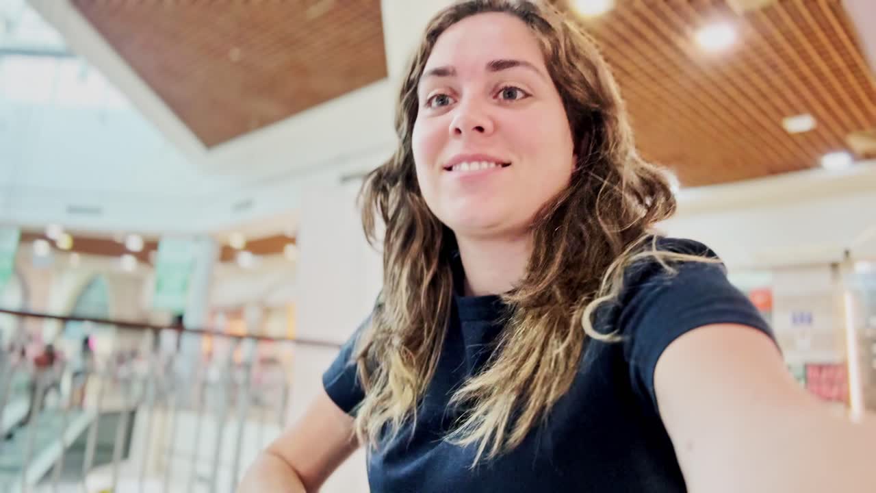 Happy Student with Laptop on University Campus