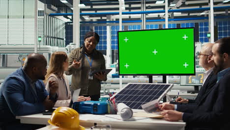 researchers analyze solar cell prototypes using chroma key display