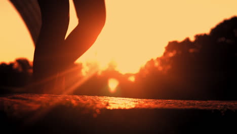 experience the invigorating beauty of a morning run with this stunning footage of a man jogging in the golden sunlight