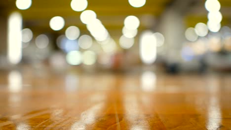 wood floor with out of focus bokeh blur abstract background shallow depth of field with copy space for insert product or text