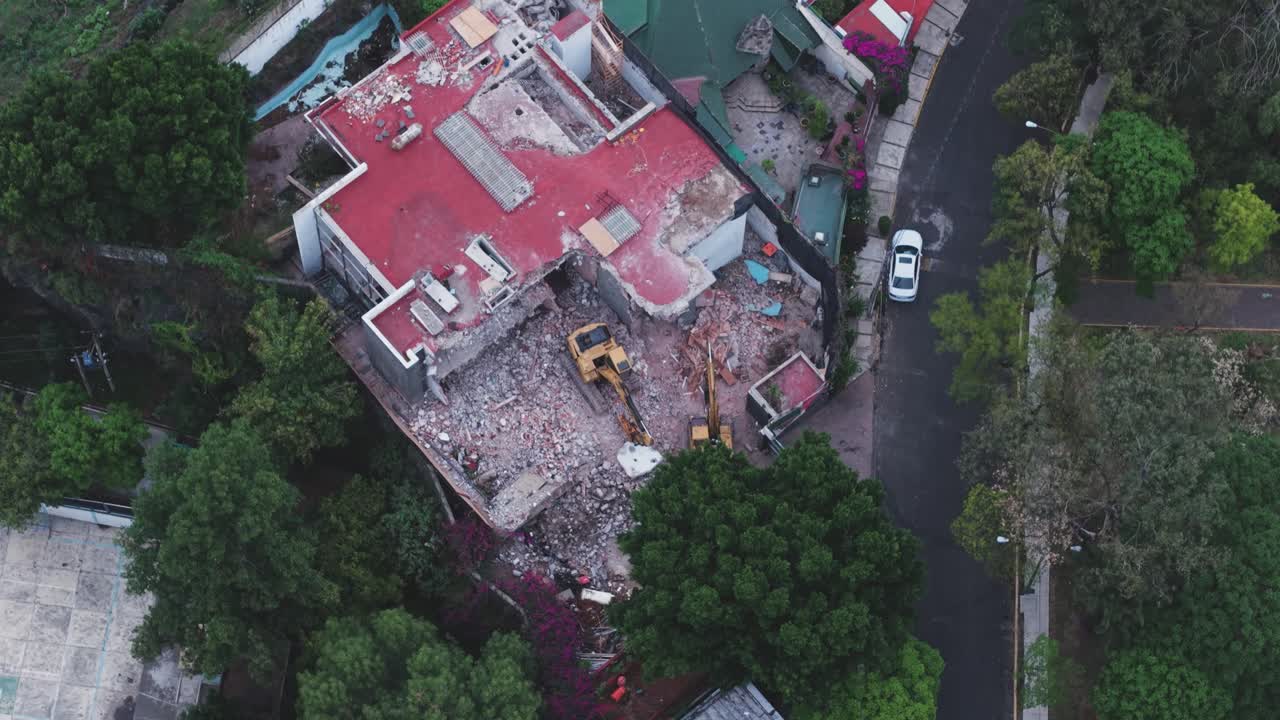 Aerial shot of a house under demolition