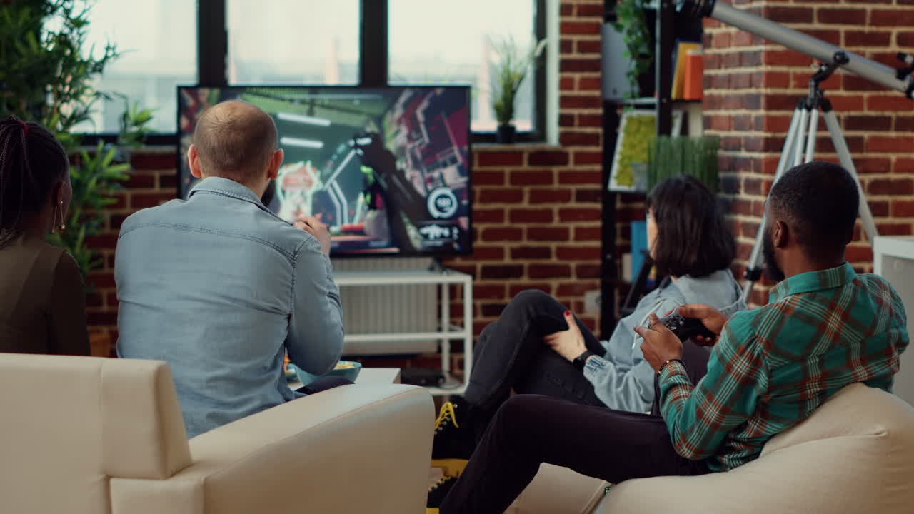 Multiethnic group of people enjoying video games play