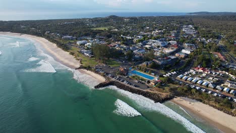 byron bay beach seawall next to main beach belongil in new south wales, australia