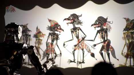 a mechanical storyteller: an advanced robot engages with intricate shadow puppetry, bringing to life colorful characters in an enchanting visual performance
