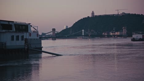 budapest sunset: danube river, chain bridge, and buda castle