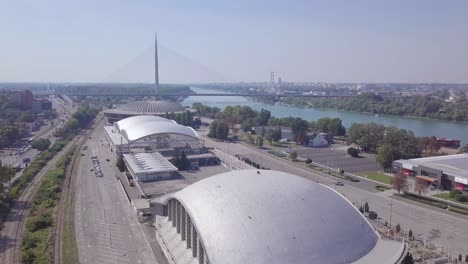 stunning revealing aerial shot of ada bridge and belgrade fair