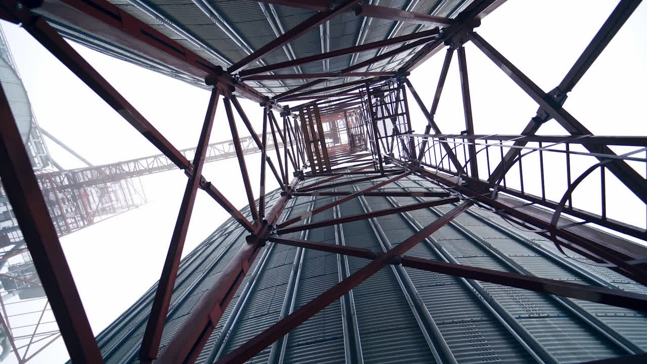 Large metal tanks for grain. Silver containers storing agriculture crop