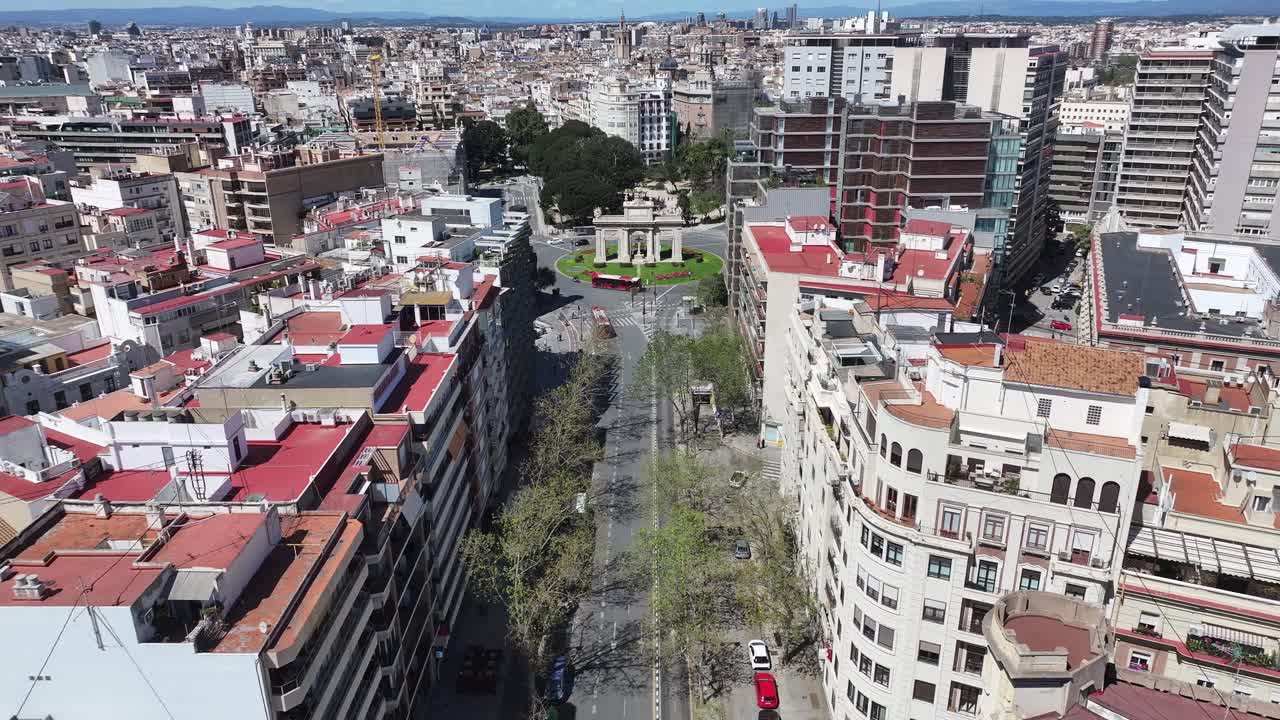 Sea Gate At Valencia In Valence Community Spain. Downtown Cityscape. Puerta De La Mar Sculpture. Valencia At Valence Community Spain. Cultural Heritage Skyline. Urban Scene.