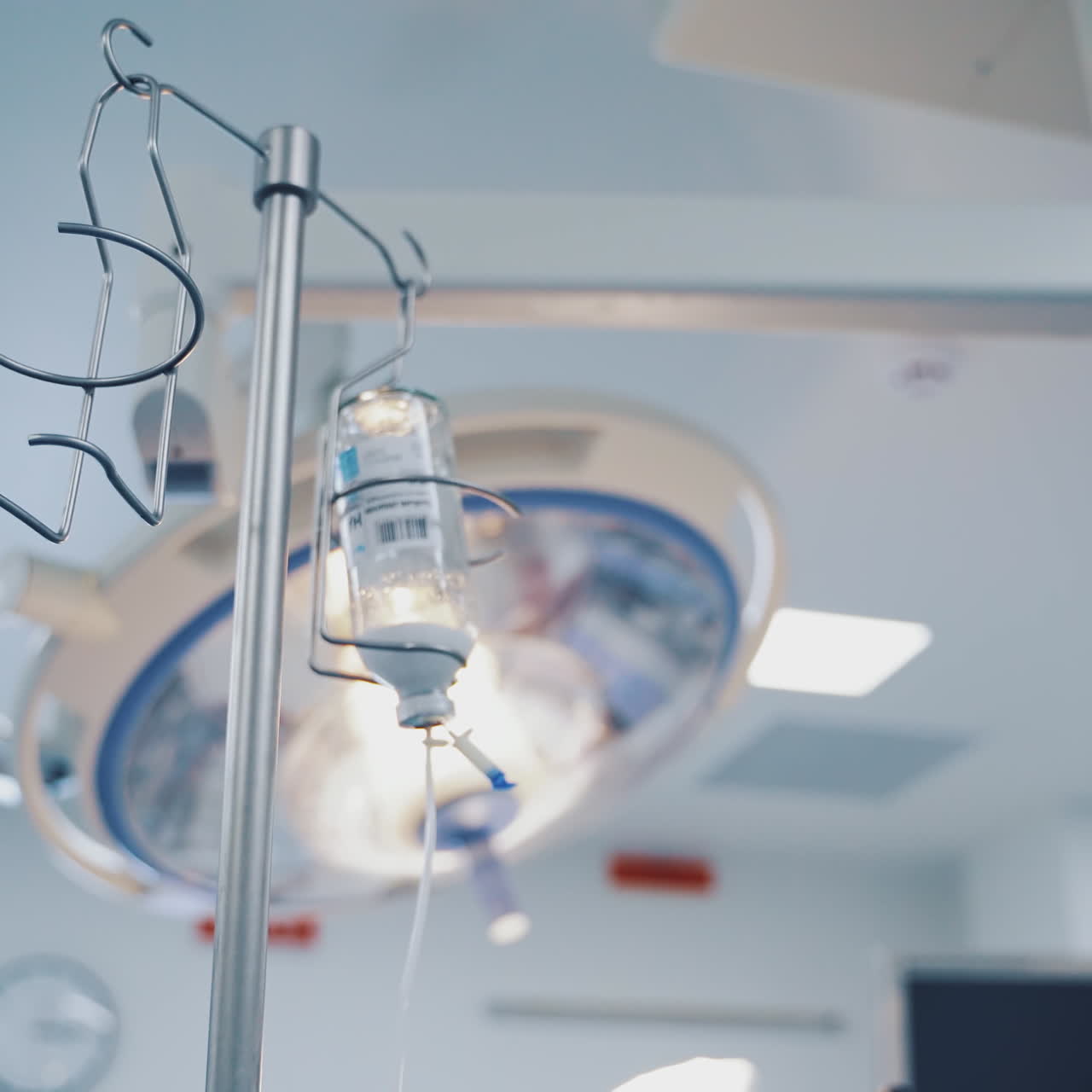 Anesthesia drop counter for patient in an operating room. Anesthesia bottle is hanging from a special support. Medical drop counter in surgical room. Close-up