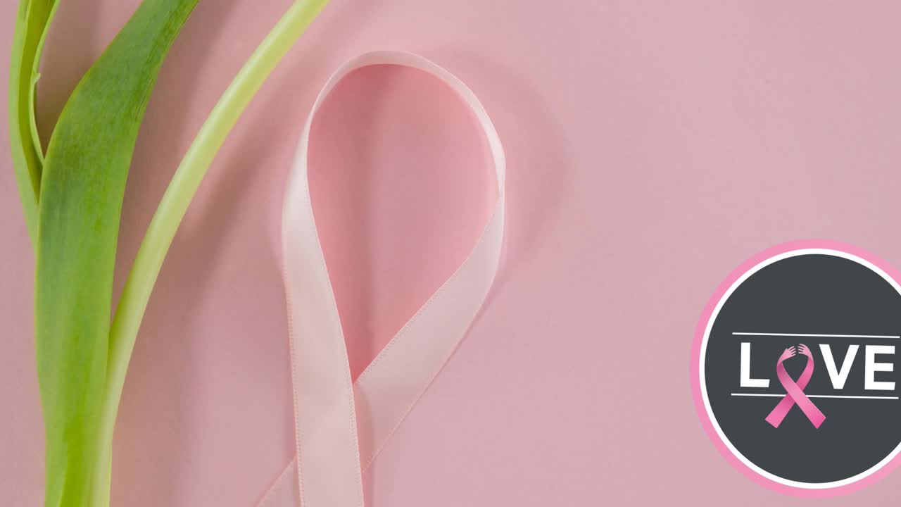 花とピンクの乳がんリボンの上にある乳がん意識のテキストのアニメーション