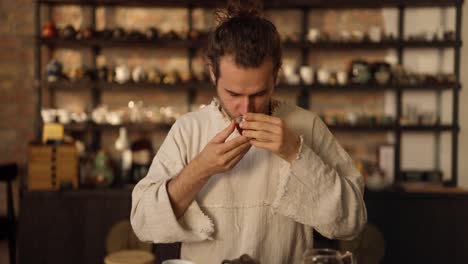 man enjoying a traditional tea ceremony