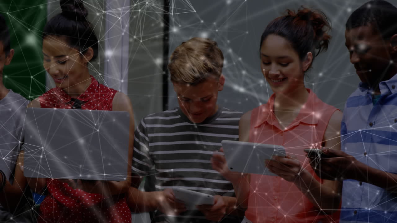 Network of connections against group of college students using electronic devices