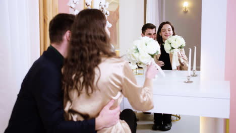 couple in wedding dress shop