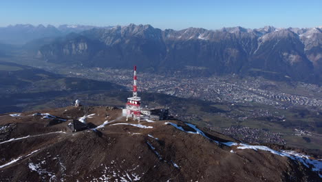 aerial view of patscherkofel in tyrol, south of innsbruck in austria with transmission tower on mountain top